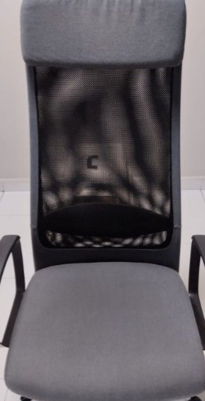 The same office task chair after RugMaster upholstery cleaning