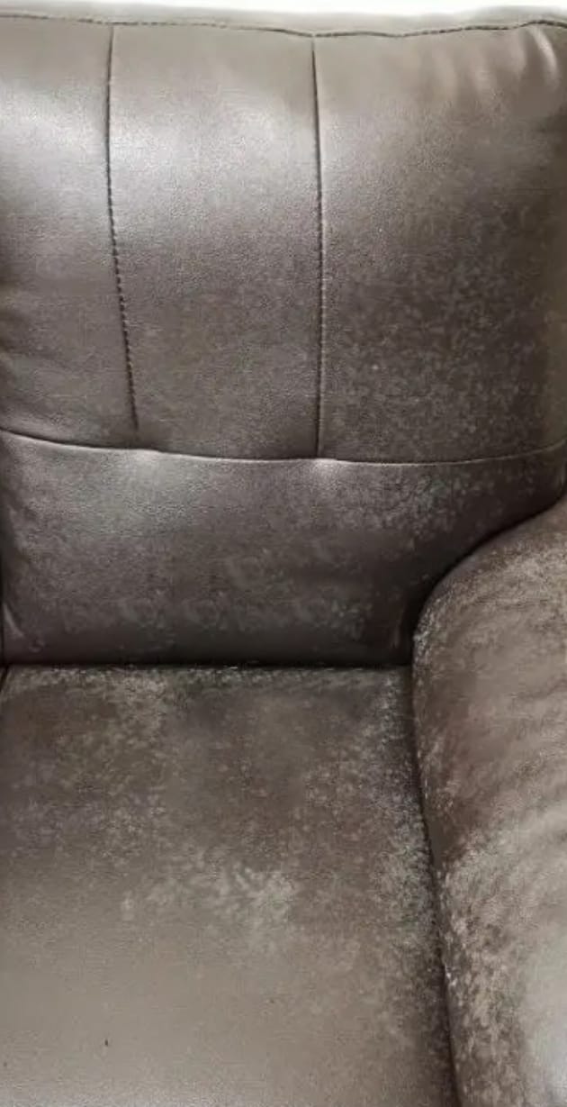 Dark leather office seating before cleaning